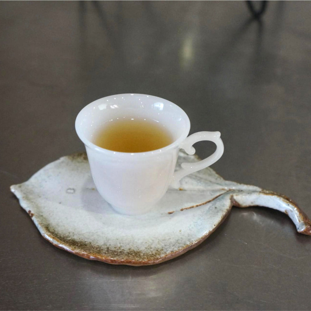 Jade Bell | Handcrafted Dehua White Porcelain Miniature Cup with Sculpted Handle