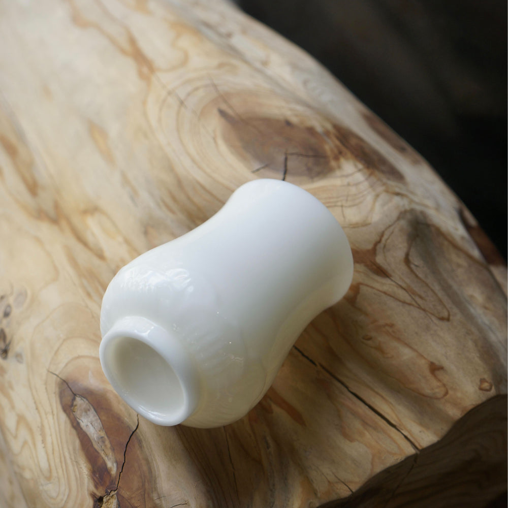 Lotus Embrace | Handcrafted Dehua Mutton-Fat Jade Porcelain Cup