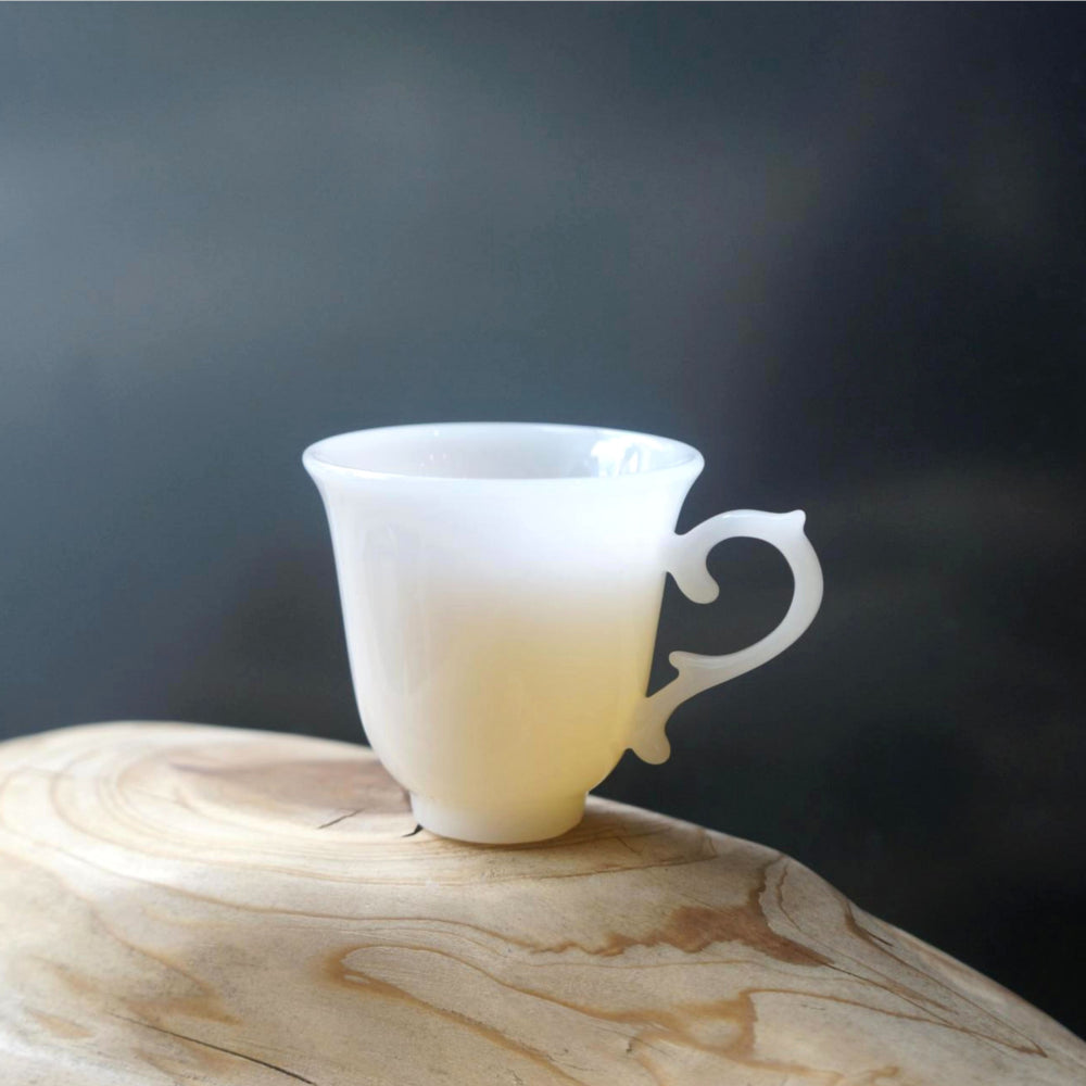 Jade Bell | Handcrafted Dehua White Porcelain Miniature Cup with Sculpted Handle
