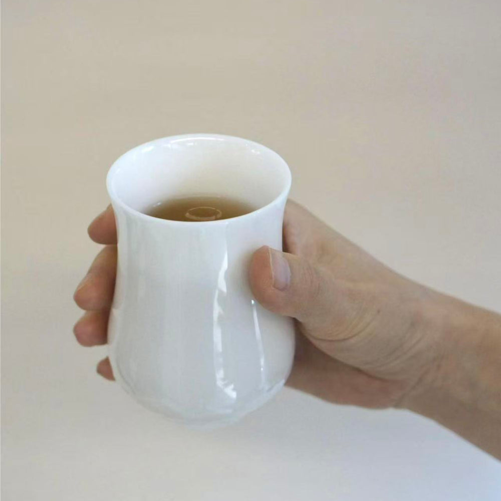 Lotus Embrace | Handcrafted Dehua Mutton-Fat Jade Porcelain Cup